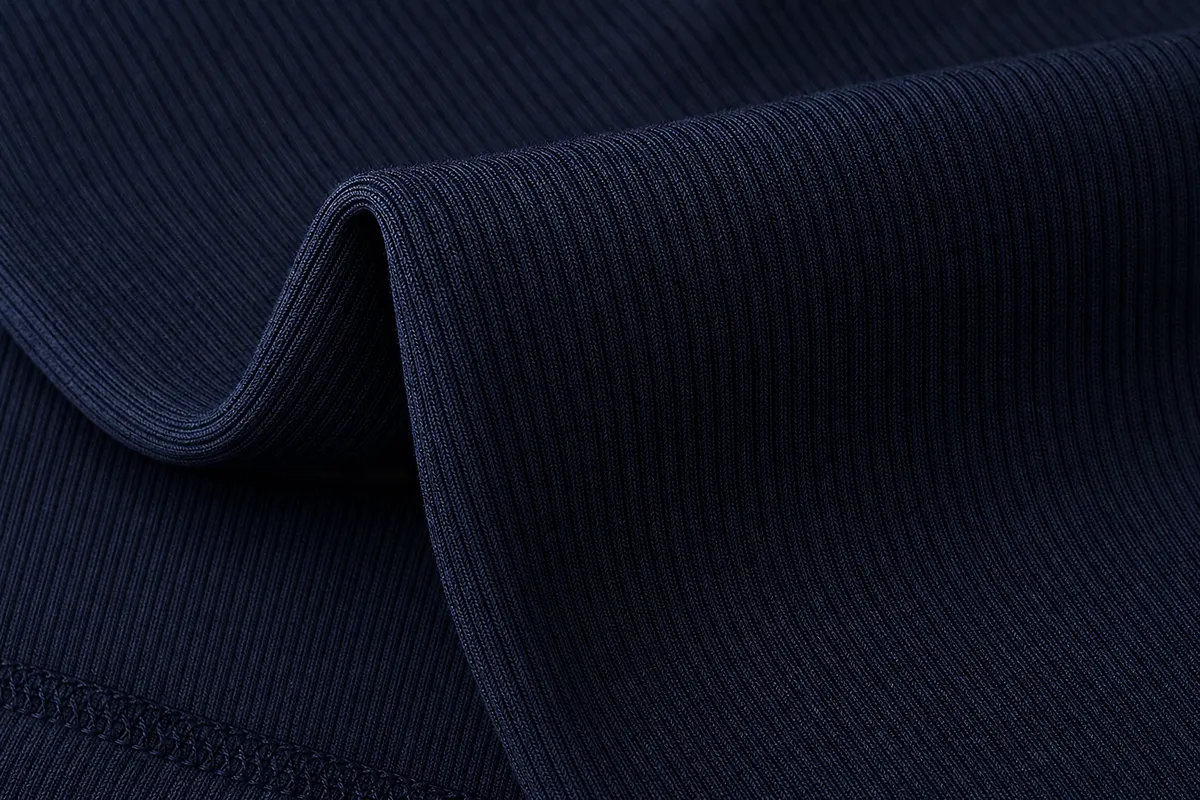 Detalhe de tecido de legging fitness com textura canelada