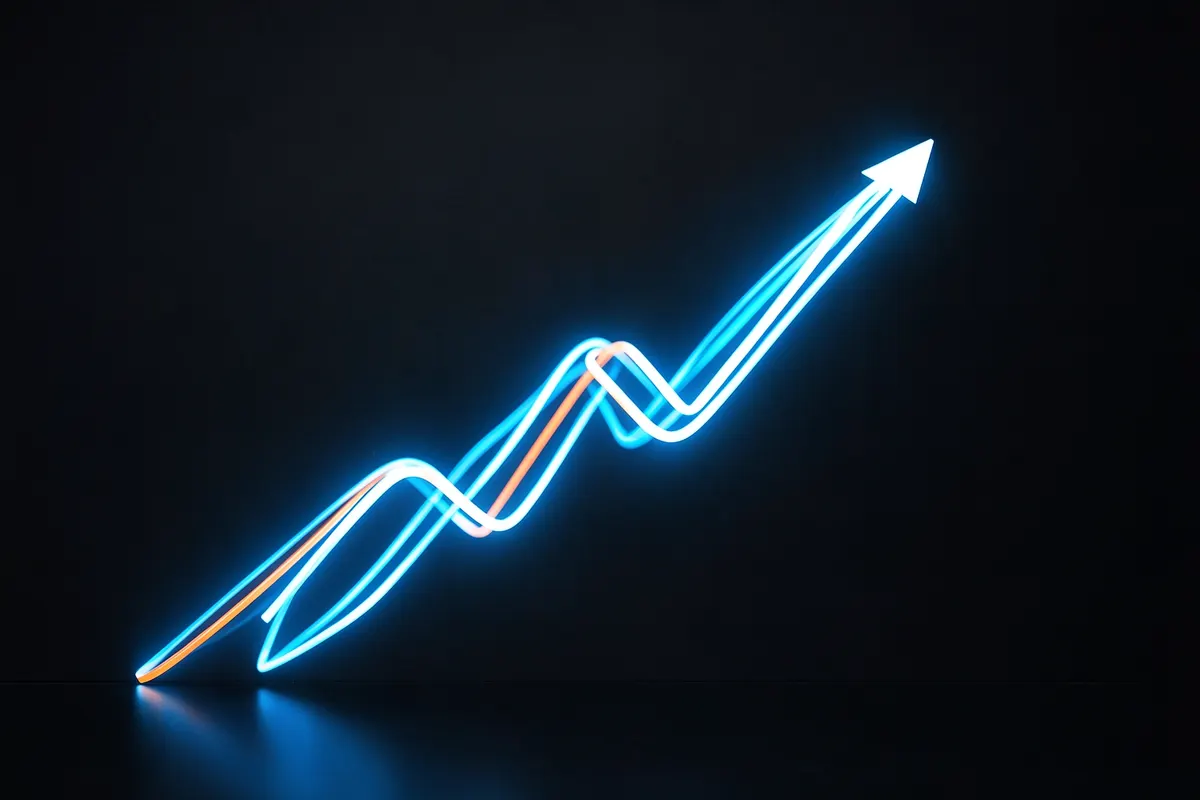 Um gráfico de linha ascendente feito de fios de luz brilhantes em um fundo escuro.